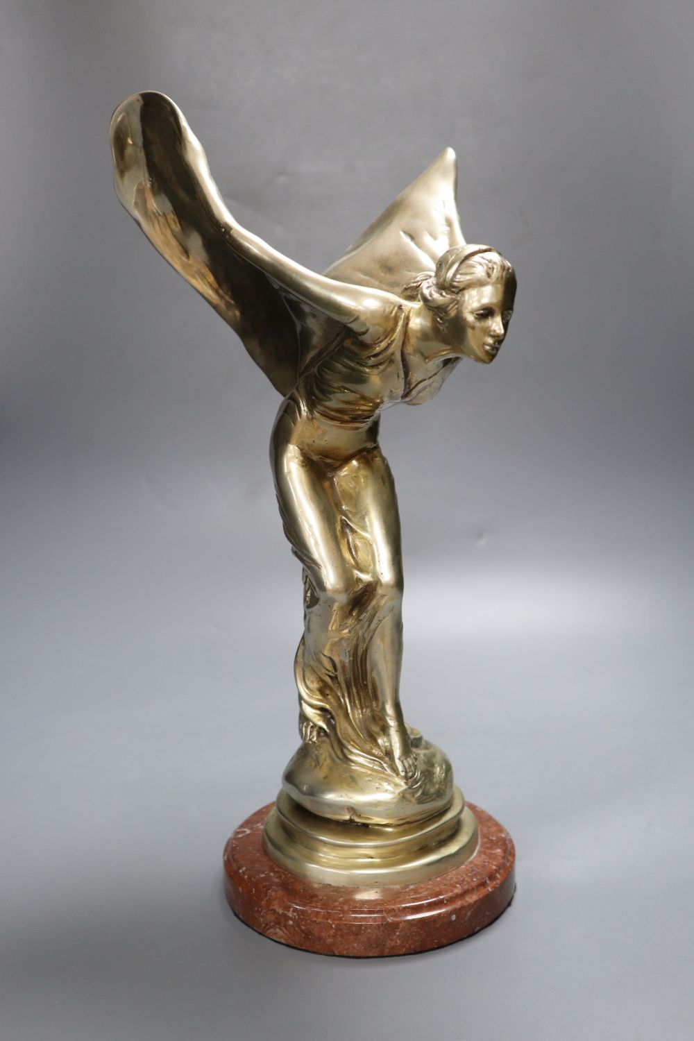 A silver plated figure in the style of Spirit of Ecstasy after Sykes, 39cm